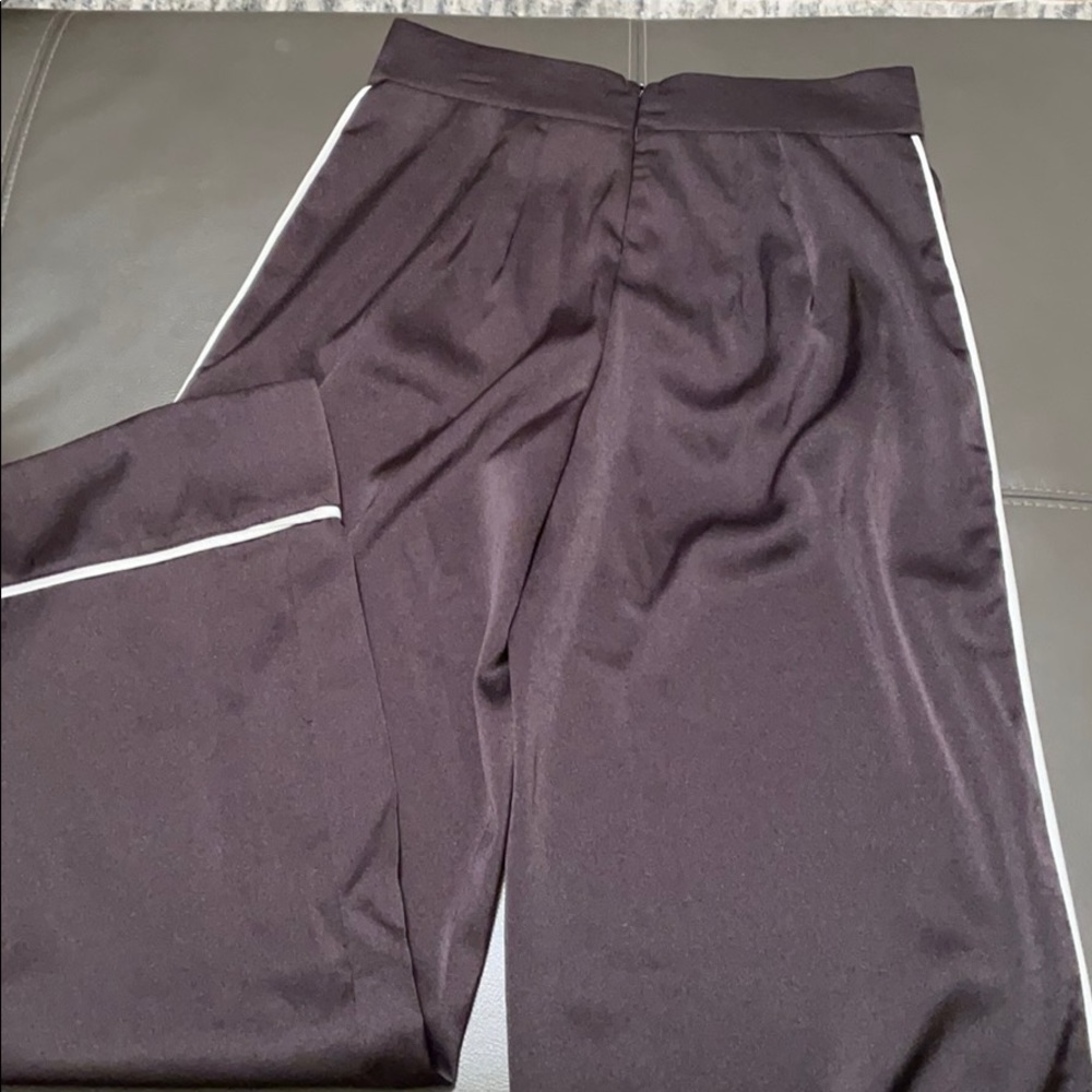 New black trousers with white stripe